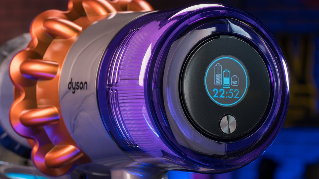 The Dyson V11 cordless vacuum's LCD screen displays the current cleaning mode, estimated remaining battery life, and charging status.