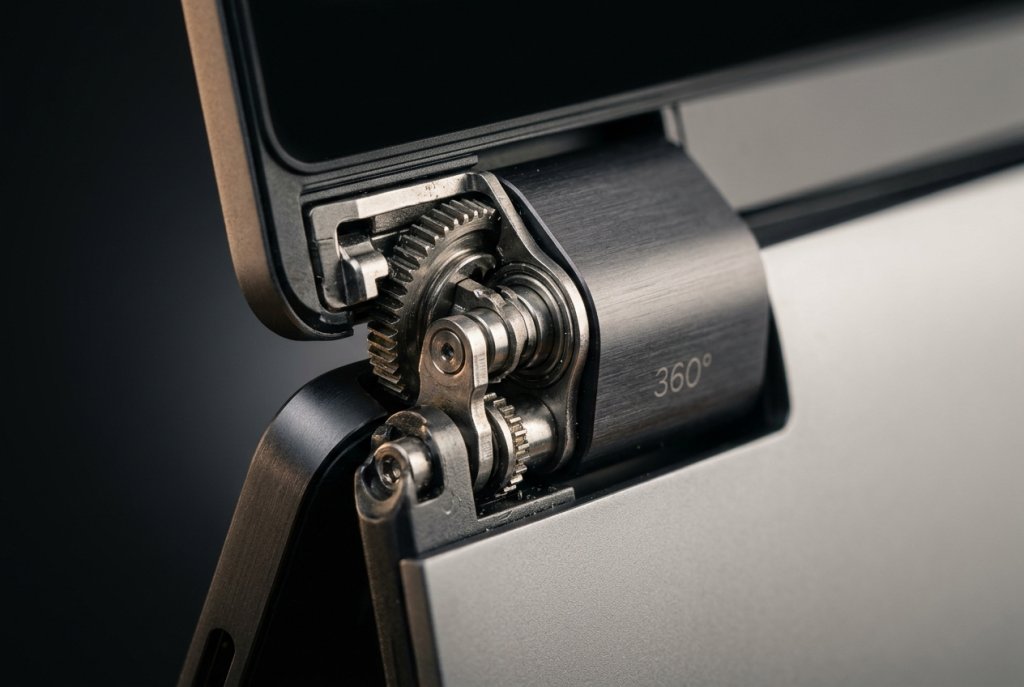 Laptop 360-degree hinge close-up.