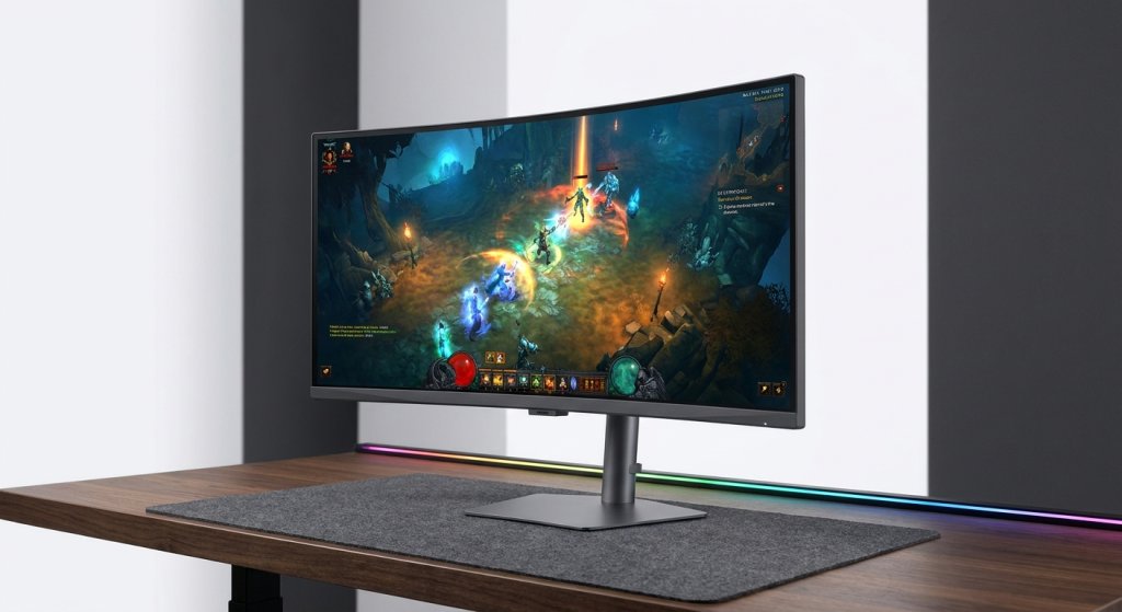 Curved 34-inch ultrawide gaming monitor on a clean modern desk setup