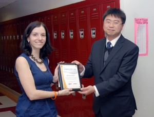 Newegg's Kevin Lee presenting Andrea with her award Newegg's Kevin Lee presenting Andrea with her award